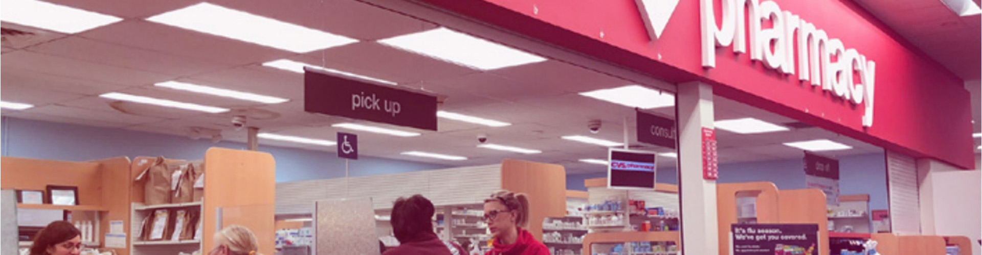 Blog banner featuring CVS pharmacy with employee and customer