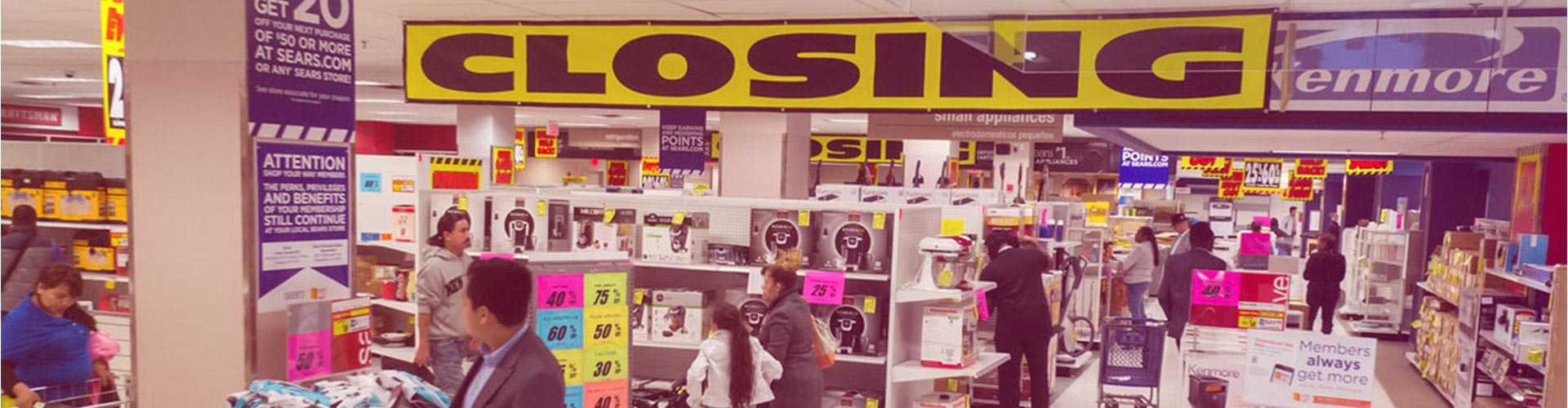 Blog banner featuring inside of a store with large closing banner hanging from ceiling
