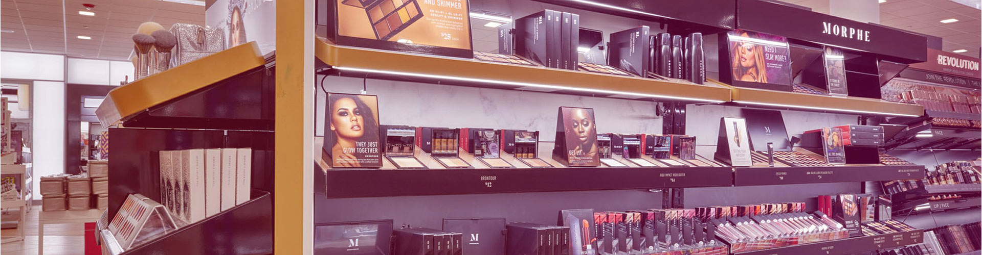 Blog banner featuring store beauty aisle with diverse models