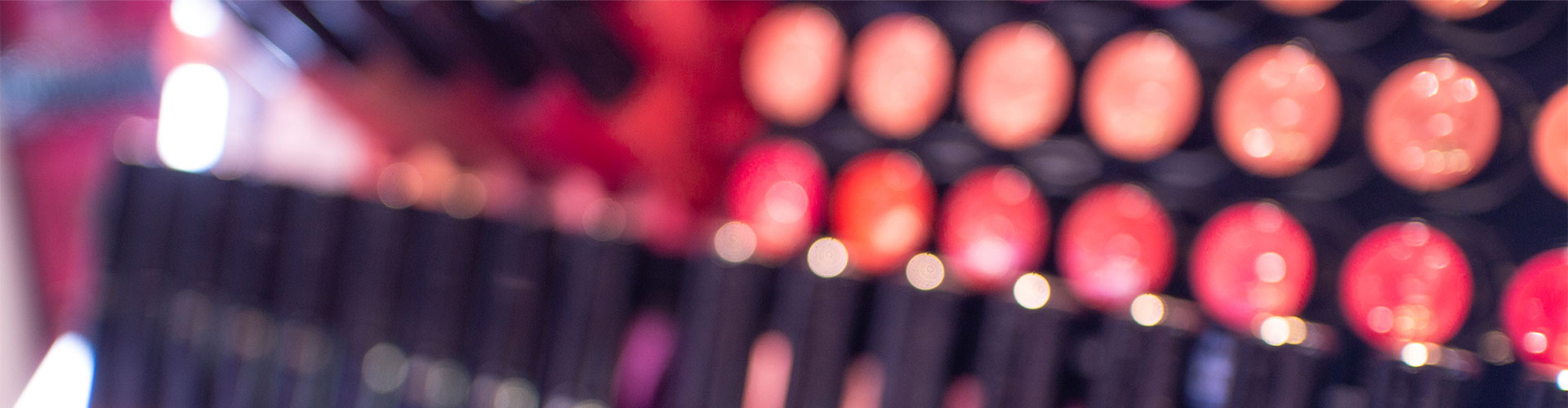 WSL Reports on The Great Makeup Crash of 2019 blog banner featuring closeup of lipstick display in store