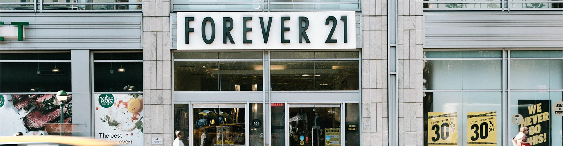 Forever 21 Bankruptcy Signals a Shift in Consumer Tastes blog banner featuring Forever 21 storefront from the street