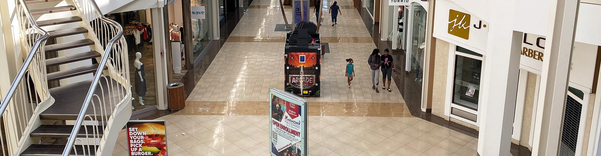 Reopened Retail Part 2: Malls in Fort Worth & Dallas Report Banner featuring inside of Hulen Mall in Texas