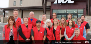 Photo of age-inclusive group of Ace Hardware employees in front of their store